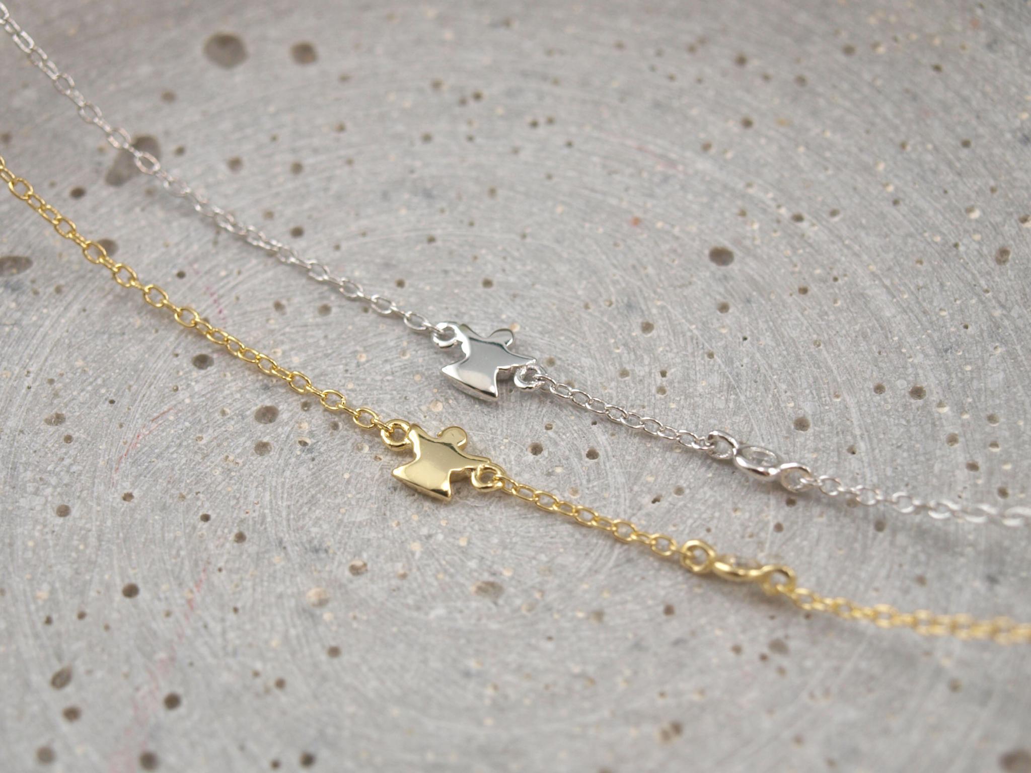 Filigranes Armband mit eingefasstem Engel und kleinem Zirkonia in Silber oder Gold
