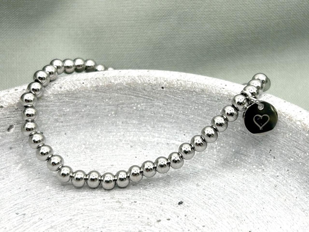 Armband aus Perlen aus Chirurgenstahl mit gravierbarem Plättchen