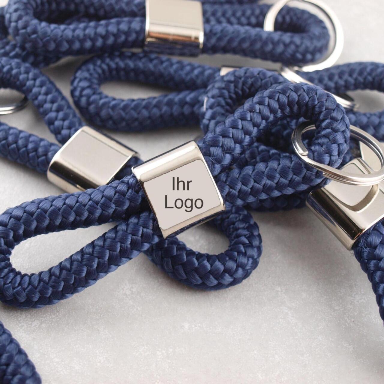 Bedruckte Werbeartikel mit Firmen Logo, gravierte Werbemittel, Werbegeschenke, schnelle Lieferung, nachhaltige Werbeartikel, in kleinen Auflagen, made in Germany, Schlüsselanhänger mit Logo Gravur, schnelle Lieferung.jpg