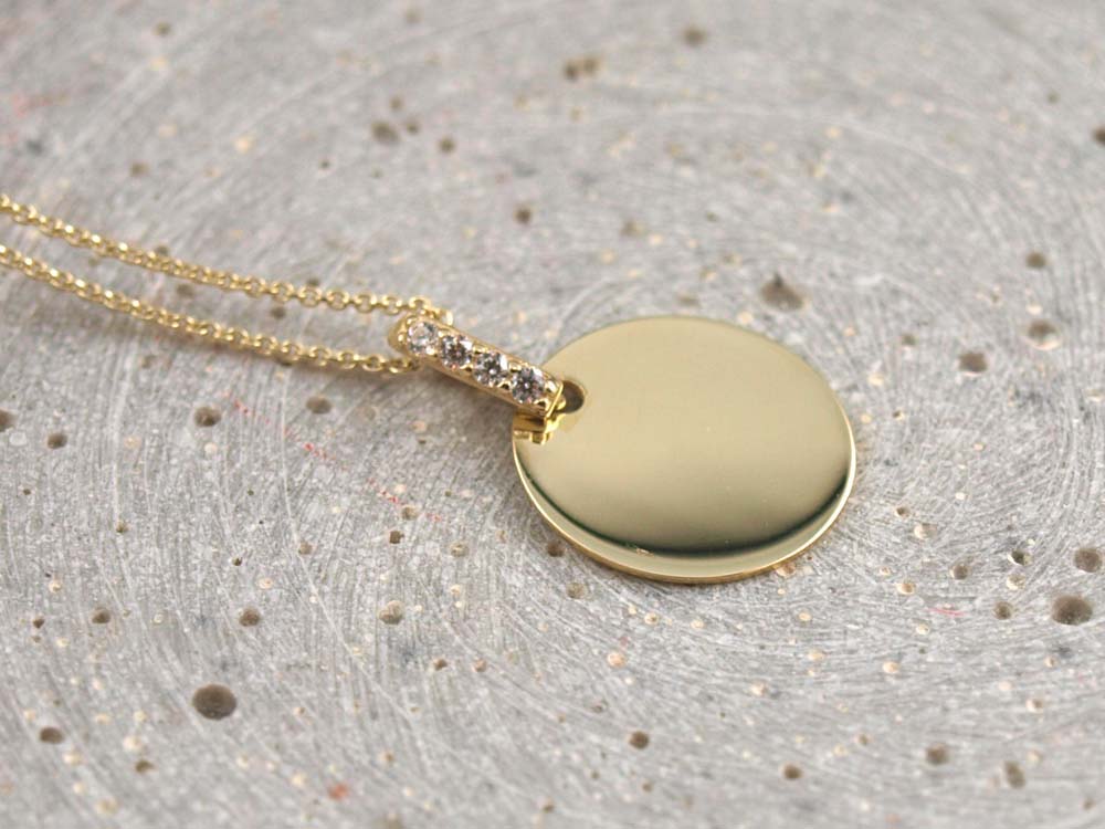 Echt goldener Anhänger mit 4 Zirkonia Steinen