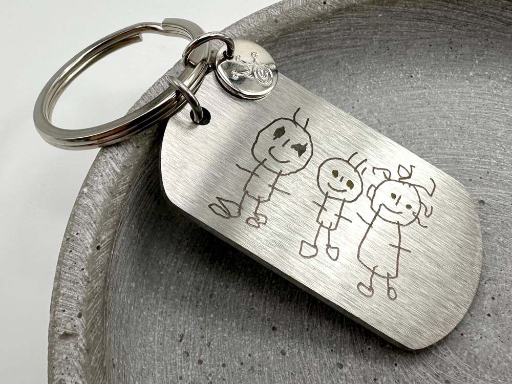 Kinderzeichnung auf Schlüsselanhänger