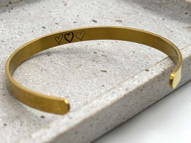 Armcuff Gold mit eigener Grafik